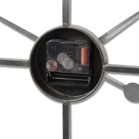large silver skeleton wall clock