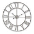 large silver skeleton wall clock