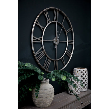 large silver foil skeleton wall clock