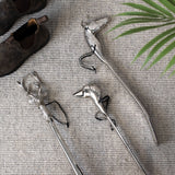 silver nickel dog head detail shoe horn