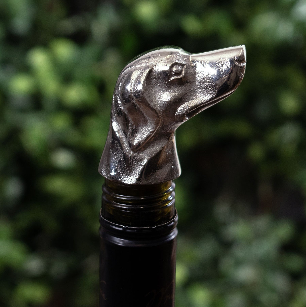 silver nickel dog bottle stopper