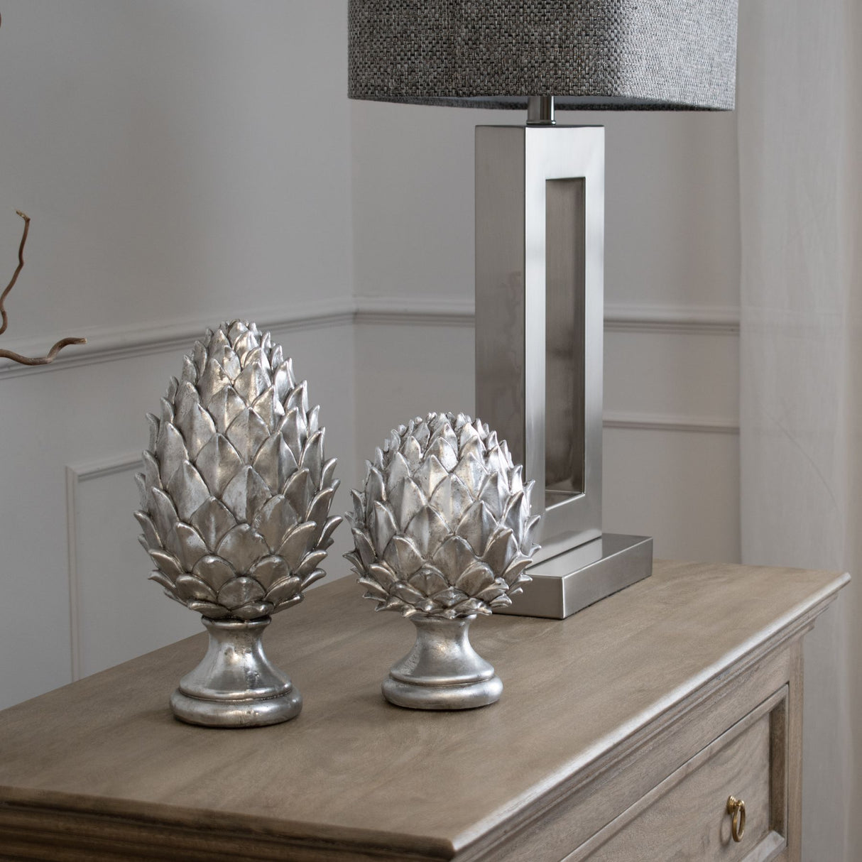 tall silver pinecone finial