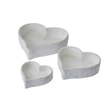 set of three large matt white ceramic dishes