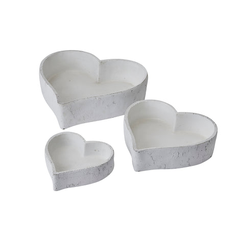 set of three large matt white ceramic dishes