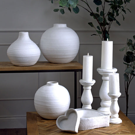 set of three large matt white ceramic dishes