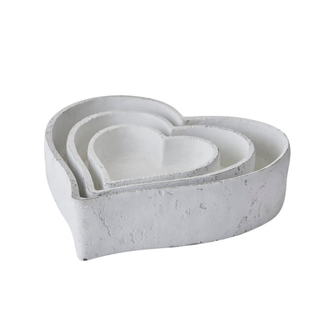 set of three large matt white ceramic dishes