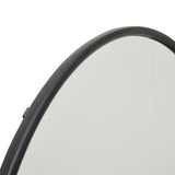 black large circular metal wall mirror
