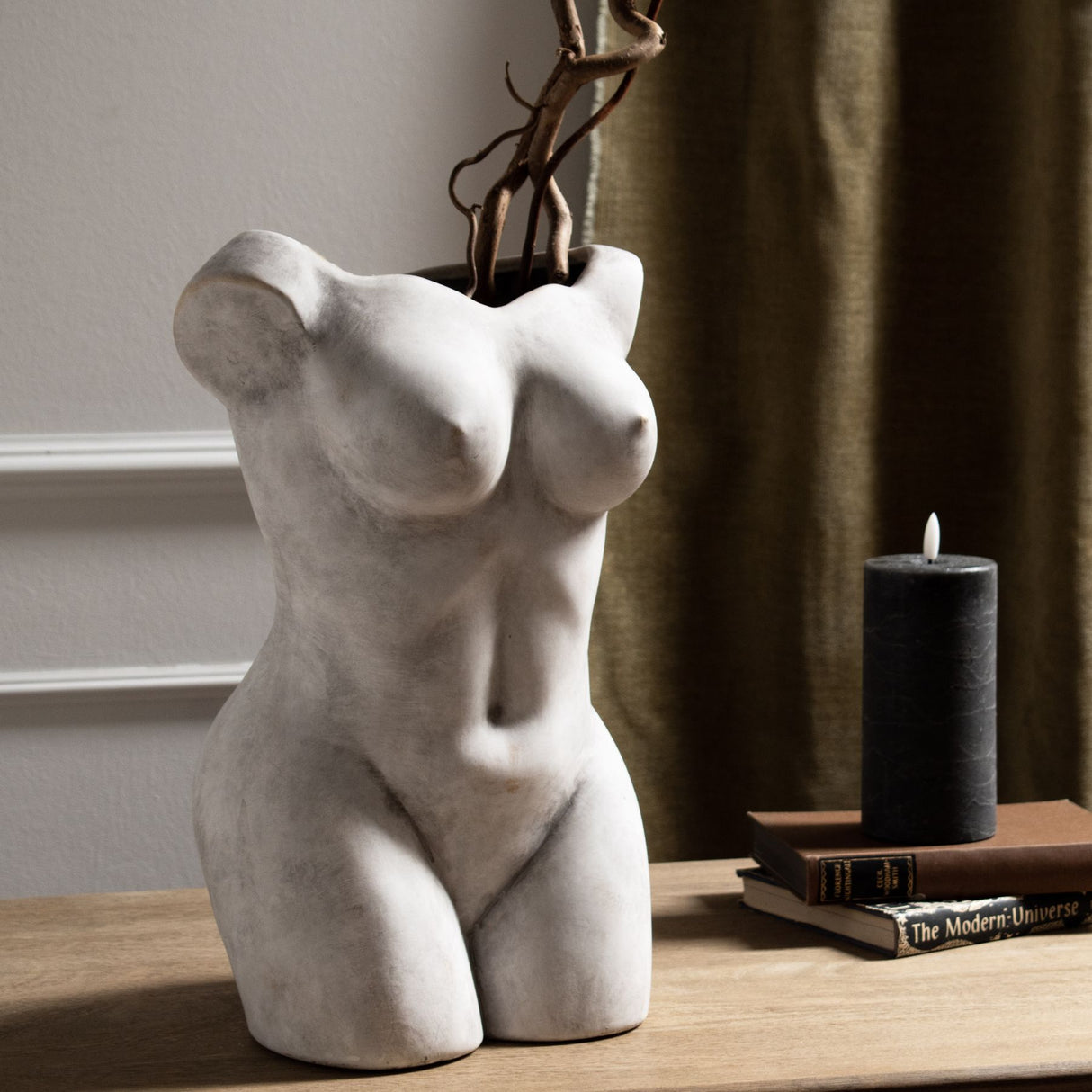 female figure vase