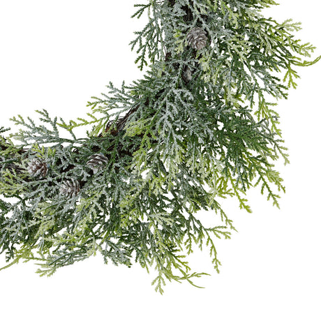 frosted pine wreath with pinecones