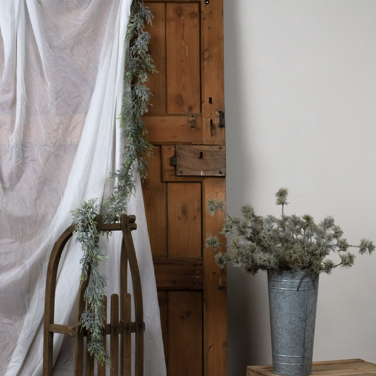 frosted pine garland with pinecones