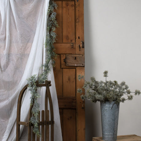 frosted pine garland with pinecones