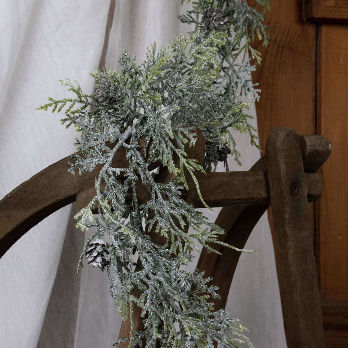 frosted pine garland with pinecones