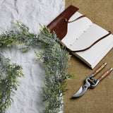 frosted pine garland with pinecones