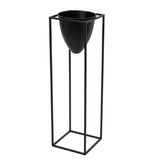 large matt black bullet planter on black frame