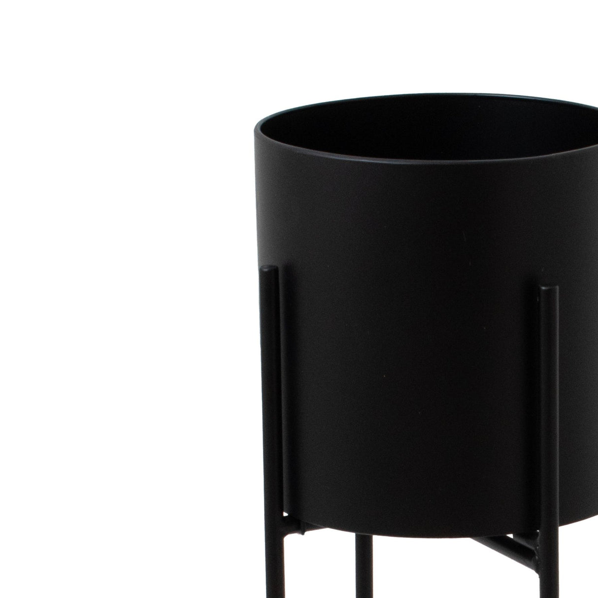 large matt black cylindrical planter on black frame