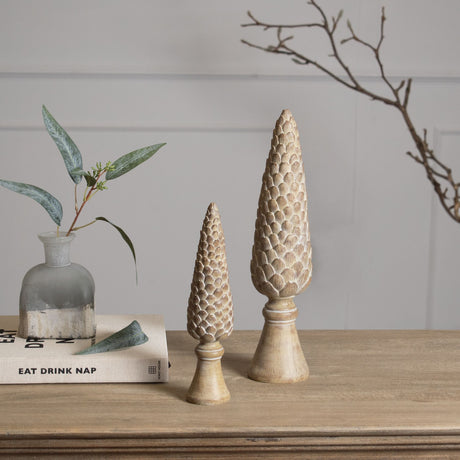 medium pinecone sculpture on base