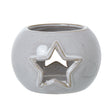 white ceramic star cut out round tealight holder