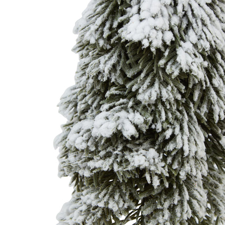 medium snowy cedar tree on wood block