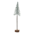 large snowy spindle tree in wood log