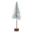 small snowy spindle tree in wood log