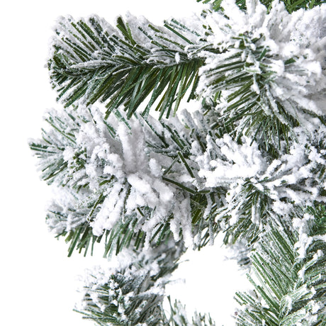 extra large snowy spruce tree