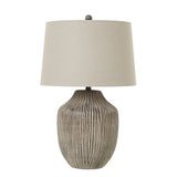 ochre carved textured table lamp with linen shade